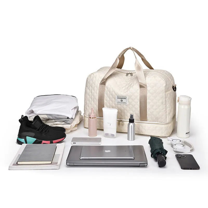 Large Oxford cloth travel holdall in a solid colour, shown with a capacity of 36-55 litres for buggies and luggage.
