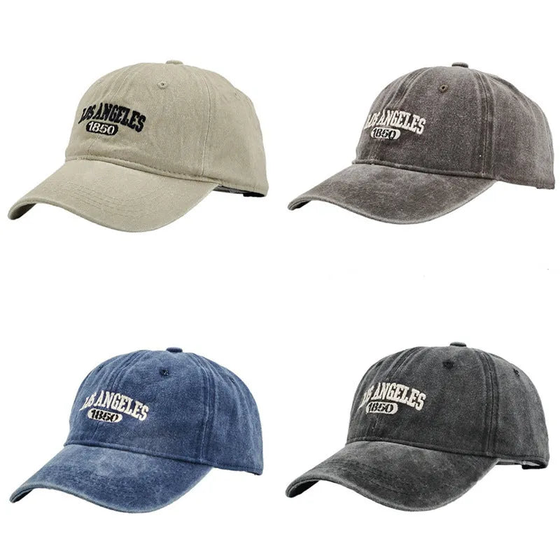 Retro personalised distressed peaked cap with embroidered letters, shown on adjustable strap, in navy blue colour.