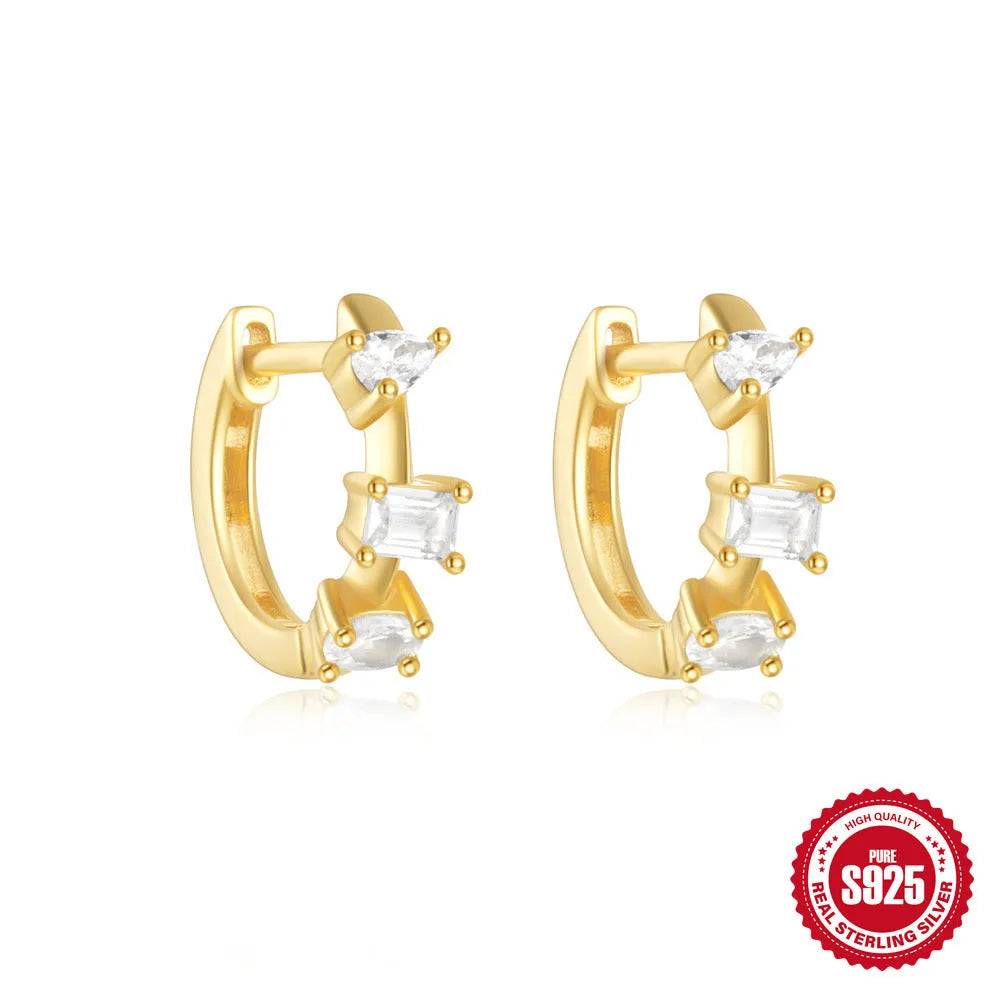 Small round geometric sterling silver stud earrings with diamond accents in gold or silver colour