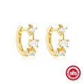 Small round geometric sterling silver stud earrings with diamond accents in gold or silver colour