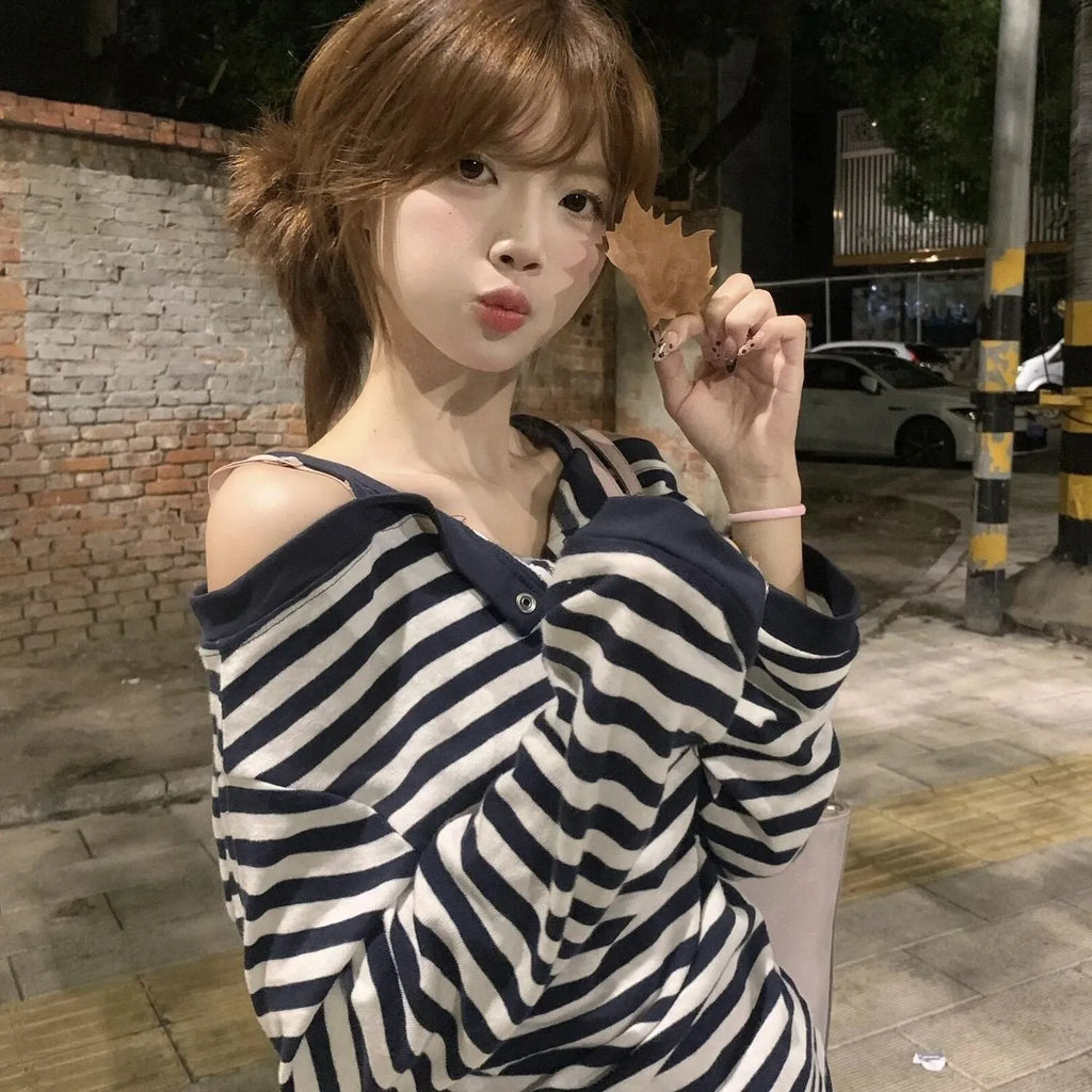 Dark blue women's oversized long-sleeve t-shirt with Korean style, embroidery, and stripe details.