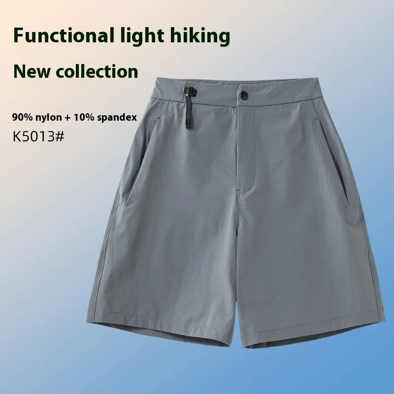 Men's quick-drying sports shorts in khaki colour with a four-sided elastic waistband, shown flat.