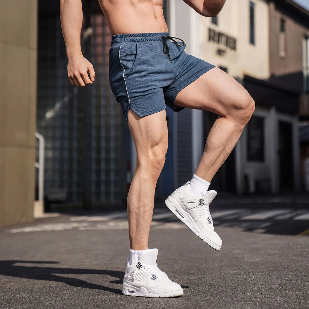 Men's straight-leg polyester sports shorts in black, available in sizes M to 3XL.