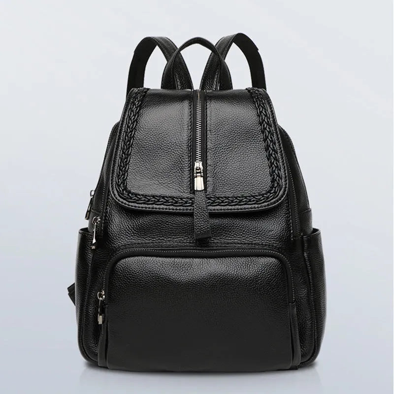 Blue genuine leather women's backpack with street style design showing internal organiser compartments