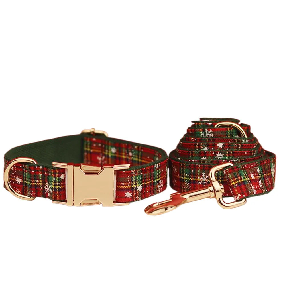 Christmas pet collar four-piece set with green background snowflake design showing dog collar, leash, vest and matching bow