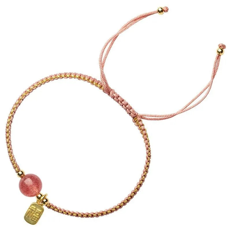Adjustable red rope bracelet with strawberry quartz beads, showcasing national style design.