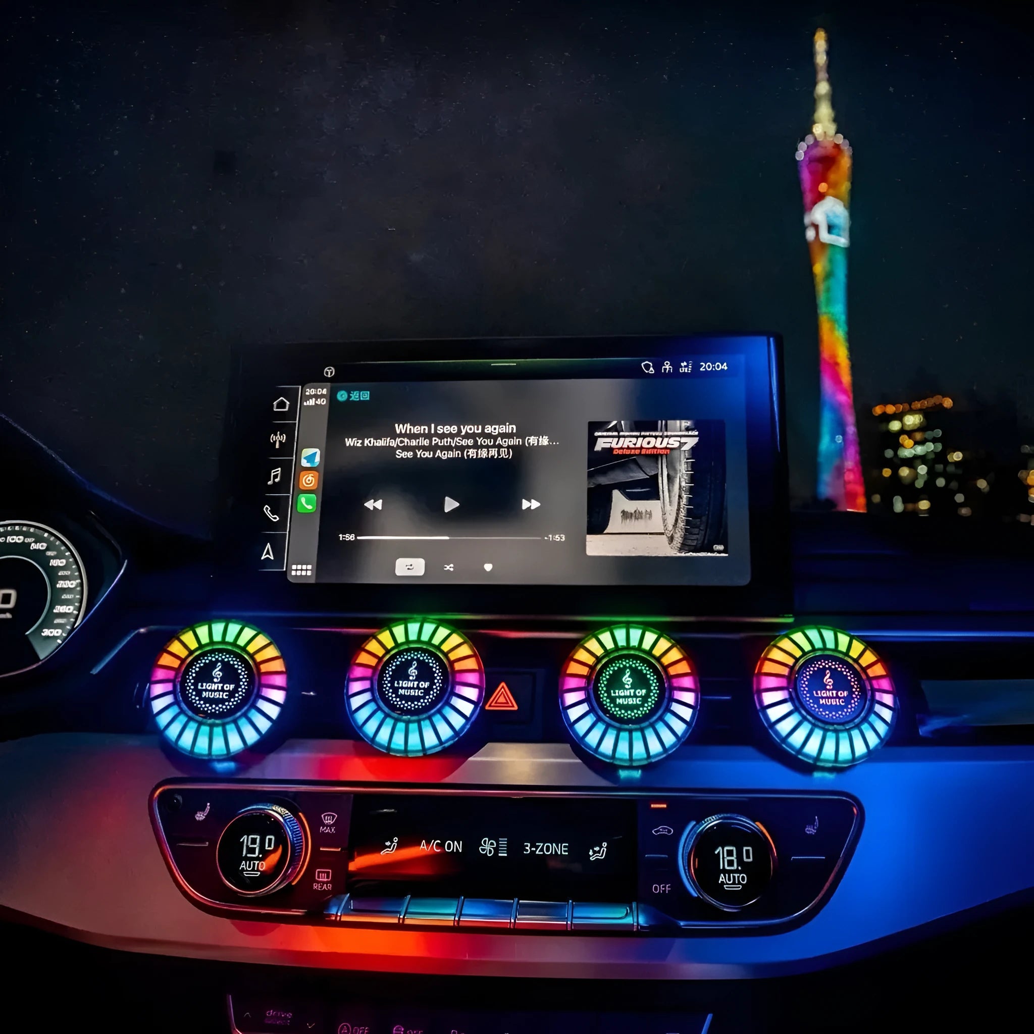 Car air vent aromatherapy unit with colourful RGB lights and choice of scent styles.