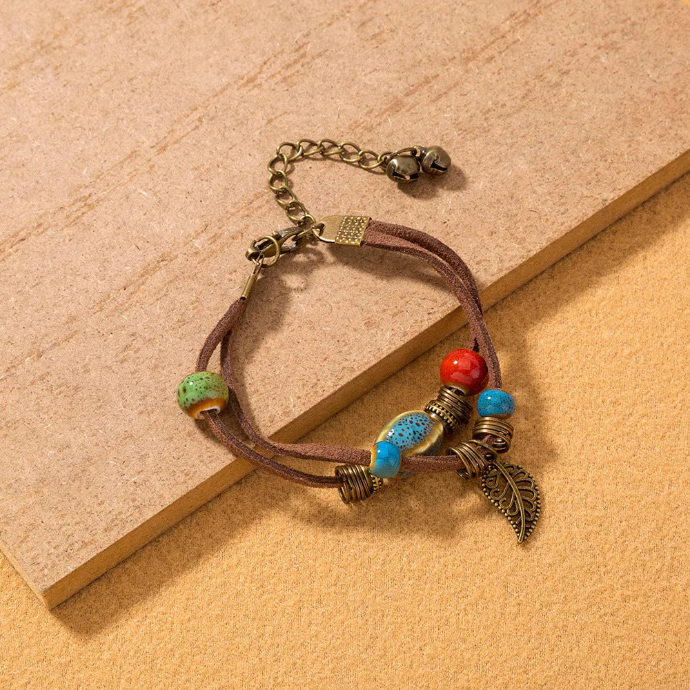 Hand-woven cowhide rope bracelet with blue ceramic beads geometric splicing style