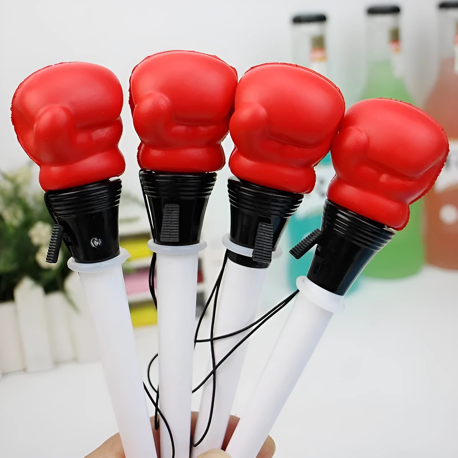 Four boxing press ejection pens with plug-in sleeve mechanism and black refills