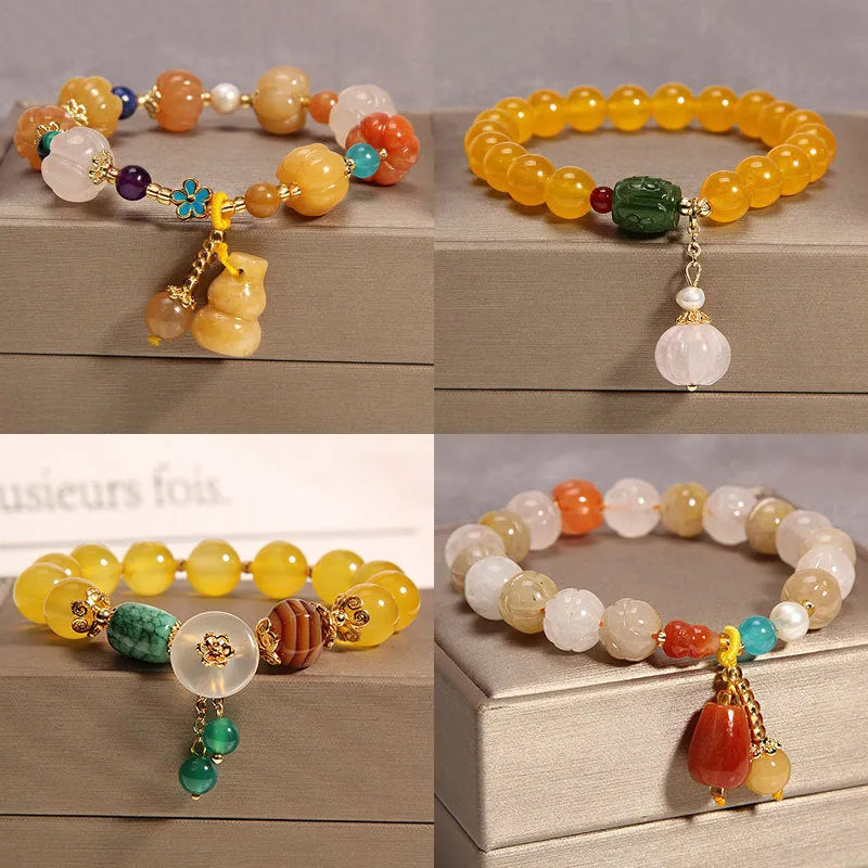 Women's yellow agate crystal bracelet with gold silk cord in adjustable khaki design