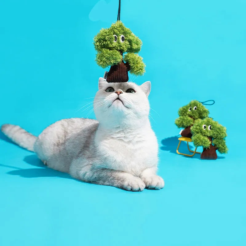 Pine wood cat toy bag pendant with jute hanging cord, filled with catnip.