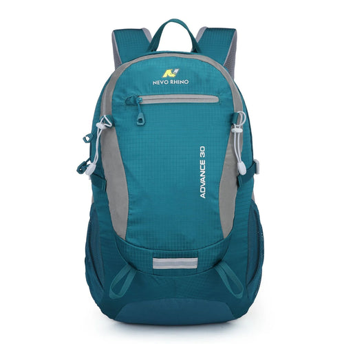30 litre dark green nylon outdoor backpack with airpillow straps on a grey background.