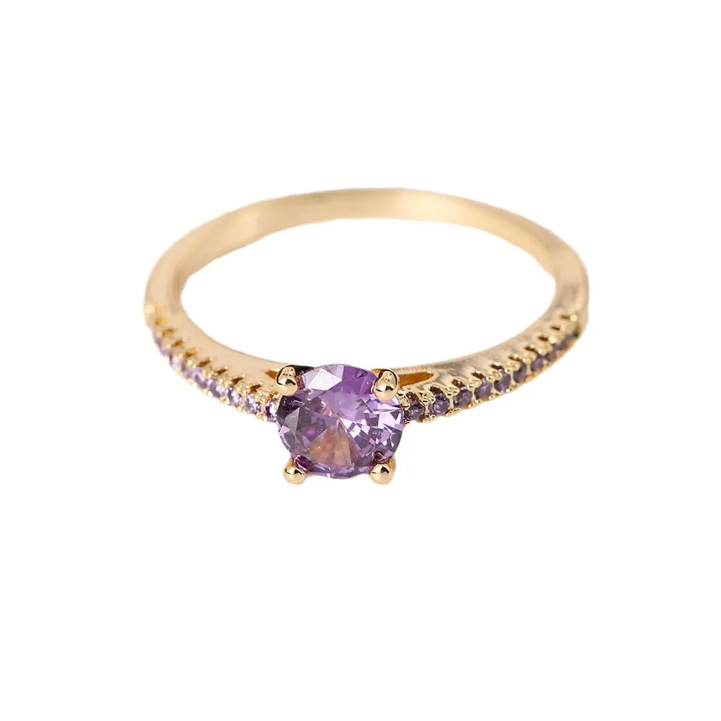 Copper zircon hexagonal geometric ring in a gold rose red electroplated finish.
