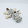Grey donkey plush dog toy with creaking sound mechanism