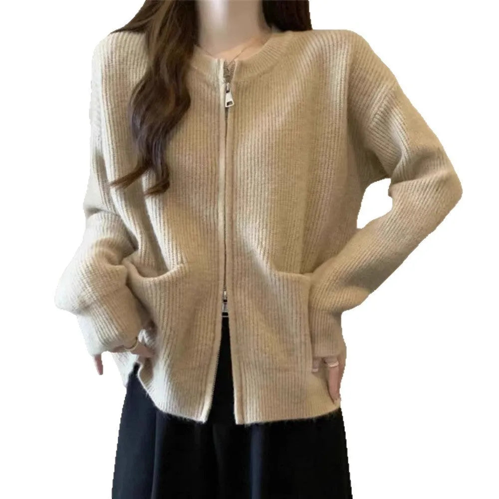 Beige viscose soft wind sweater coat, a long sleeve cardigan laid flat.