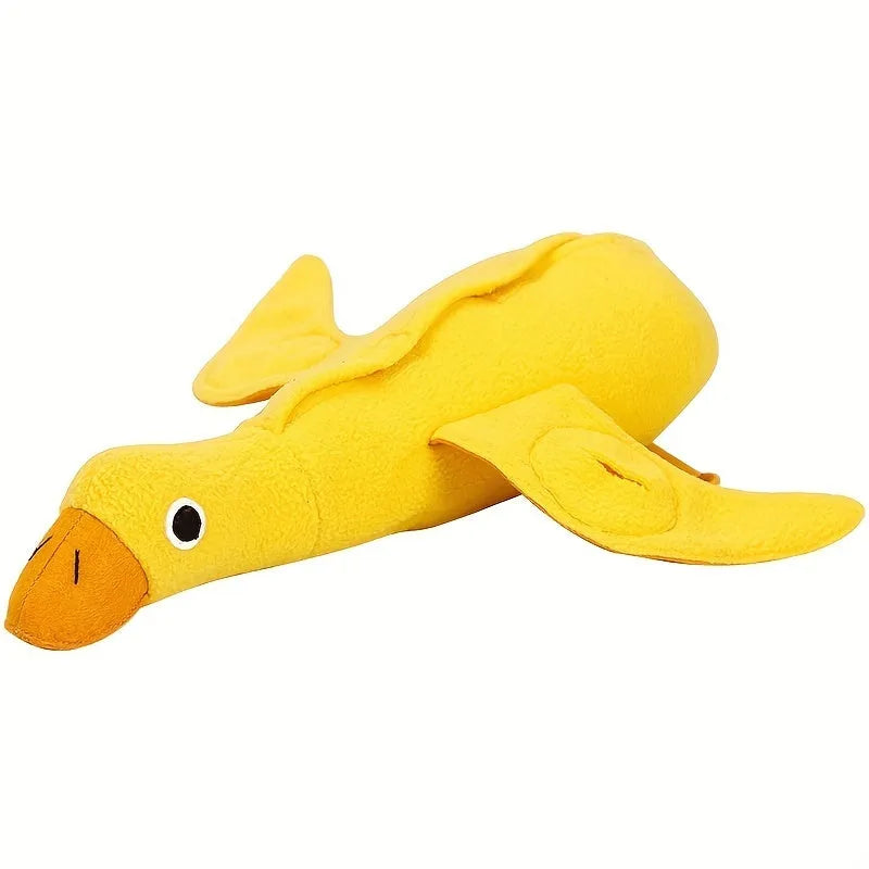Yellow teddy dog toy with duck sound mechanism and food leak holes for treat dispensing