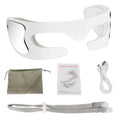 White portable rechargeable red light eye massager on a table
