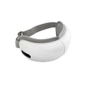 White rechargeable airbag massage and hot compress eye massager with charging cable