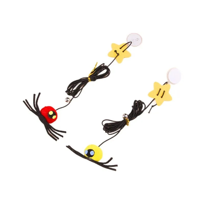 Hanging door cat toy with elastic rope, feather, bell and spider attachments in red or yellow colour
