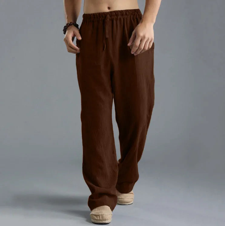 Men's linen loose casual sports pants in khaki, side view, on a hanger