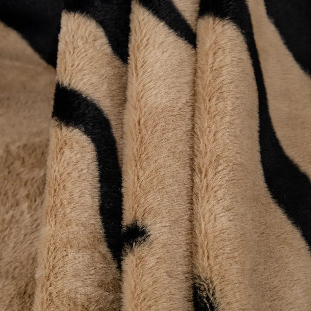 Zebra pattern flannel sofa cover with matching pillowcase in a light luxury style.