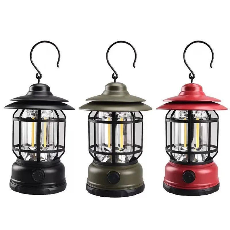 Dark green portable camping lantern with head strap, shown as a headlamp and standalone light for booths.