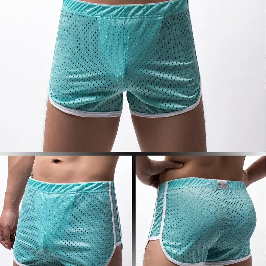Men's three-point boxers in a cotton and nylon blend, shown in black, on a mid-waist fit model.