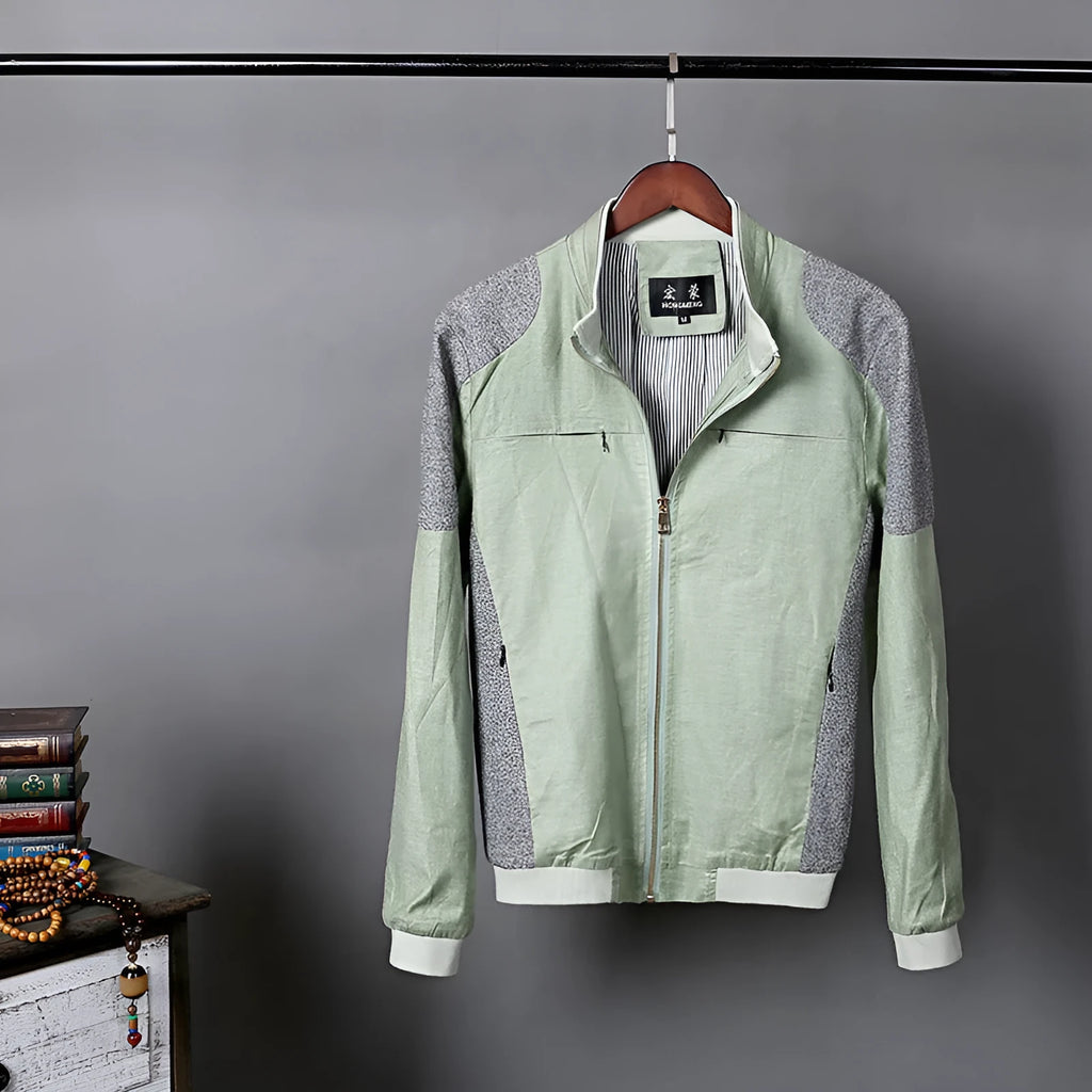 Men's thin colour block linen jacket in blue, grass green, or heather grey on a hanger.