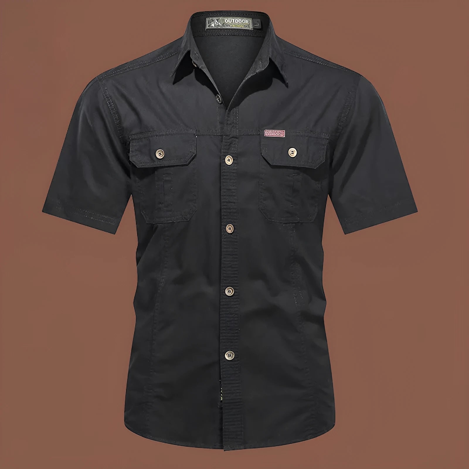 Man wearing a loose-fit army green short sleeve cotton work shirt with a cardigan style.
