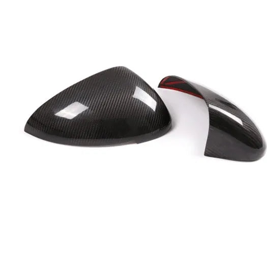 Black true carbon fibre rearview mirror covers for 14-22 Porsche Macan with visible weave texture