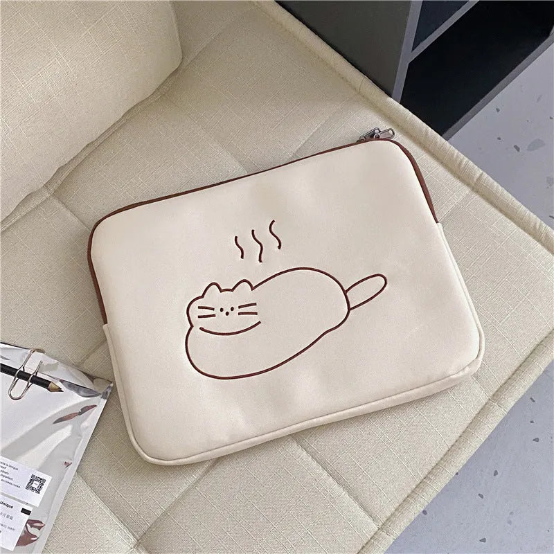 Fat cat embroidered design on a grey protective laptop sleeve with a black zip.