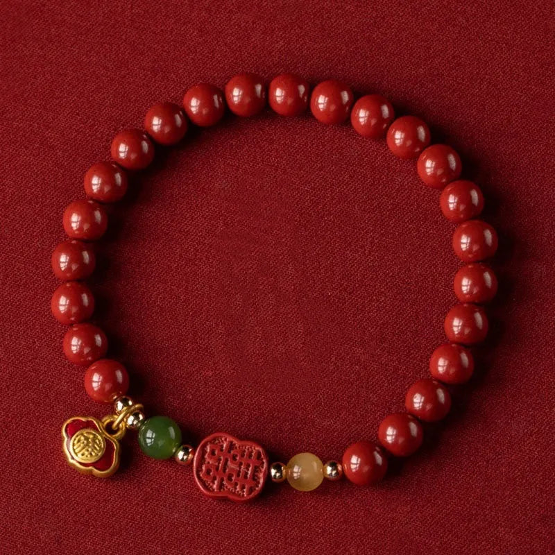 Emperor sandstone Fu character bracelet with happy eyebrow pattern in 6mm or 8mm cinnabar bead sizes