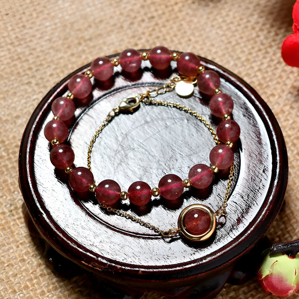 Double-layer women's bracelet with crystal beads and lucky charms in gold electroplated finish