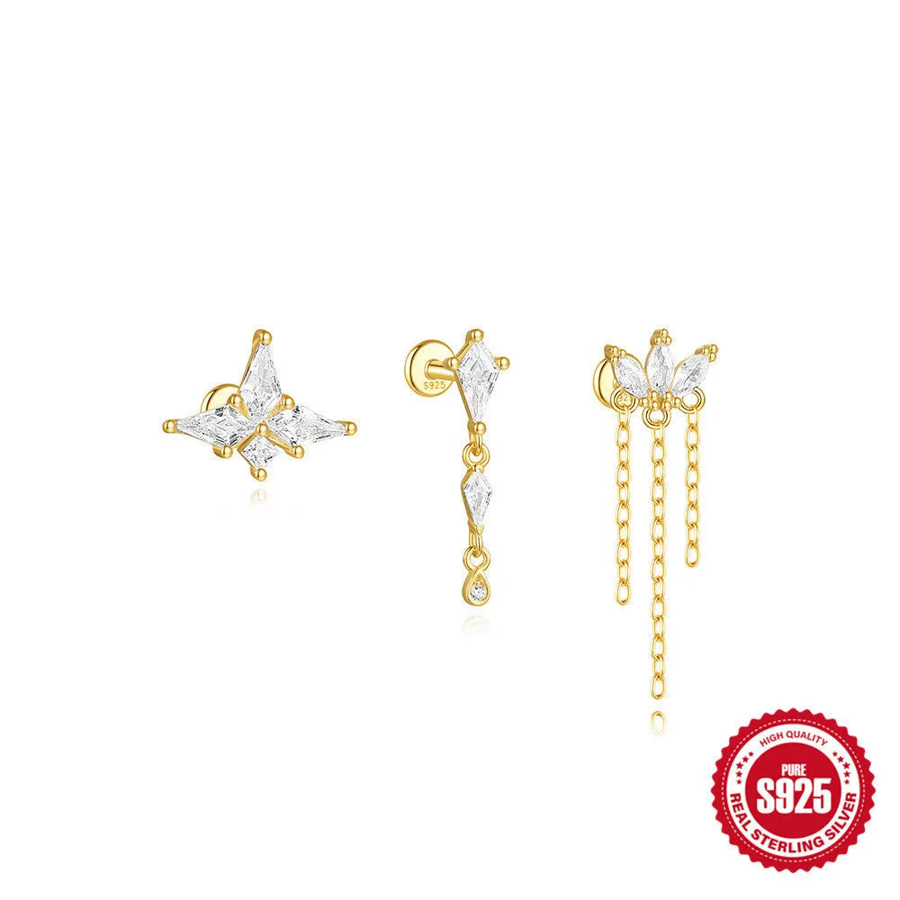 Sterling silver geometric kite-shaped earrings with a rhinestone-encrusted chain tassel in a gold colour finish.