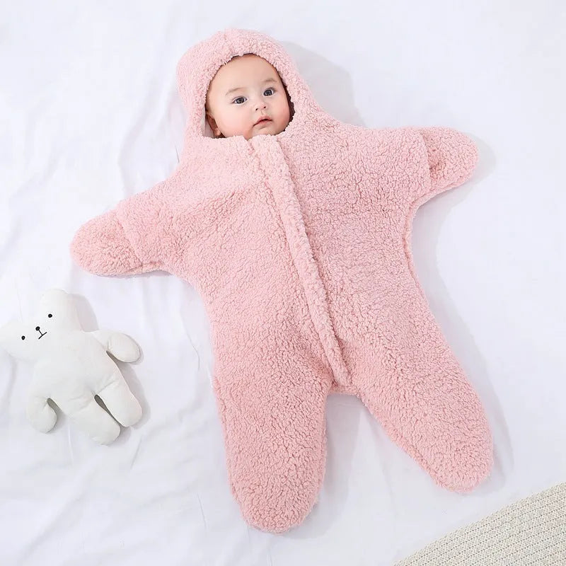 Cashmere and cotton baby sleeping bag with hood, shown in pink, grey, light blue, or khaki.
