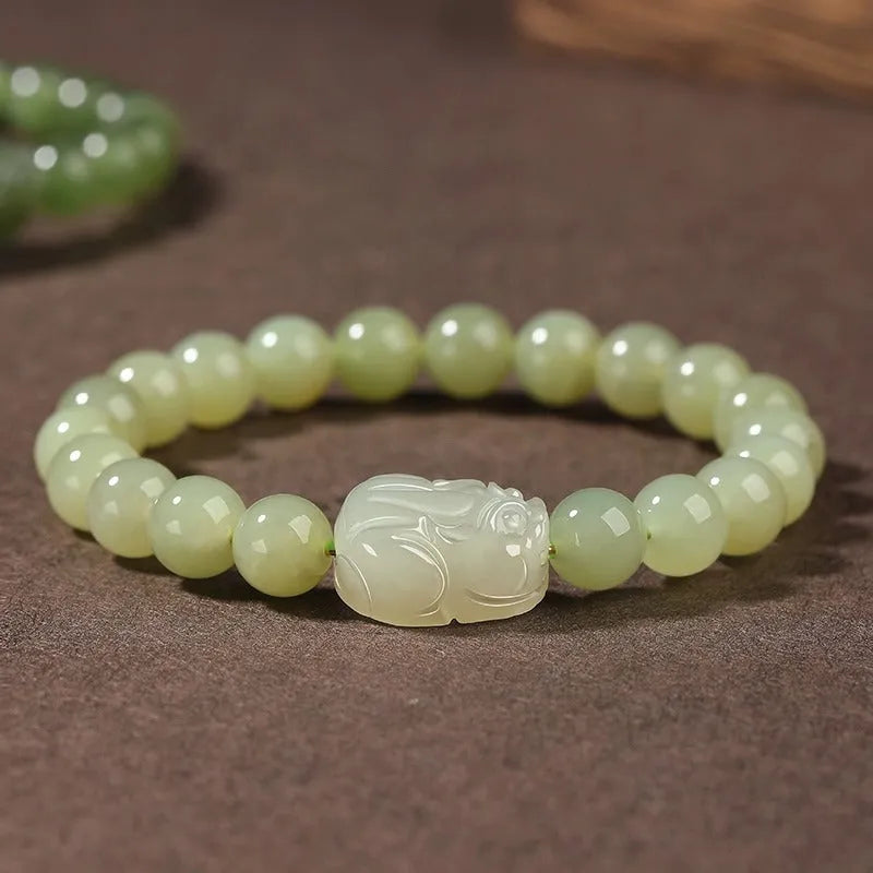Women's grey Hetian jade ethnic bracelet with polished beads in 6mm, 8mm or 10mm sizes