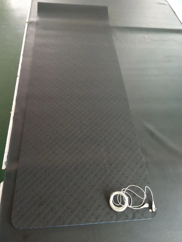 Blue conductive grounding yoga mat with plant pattern and integrated wire, measuring 182cm long.