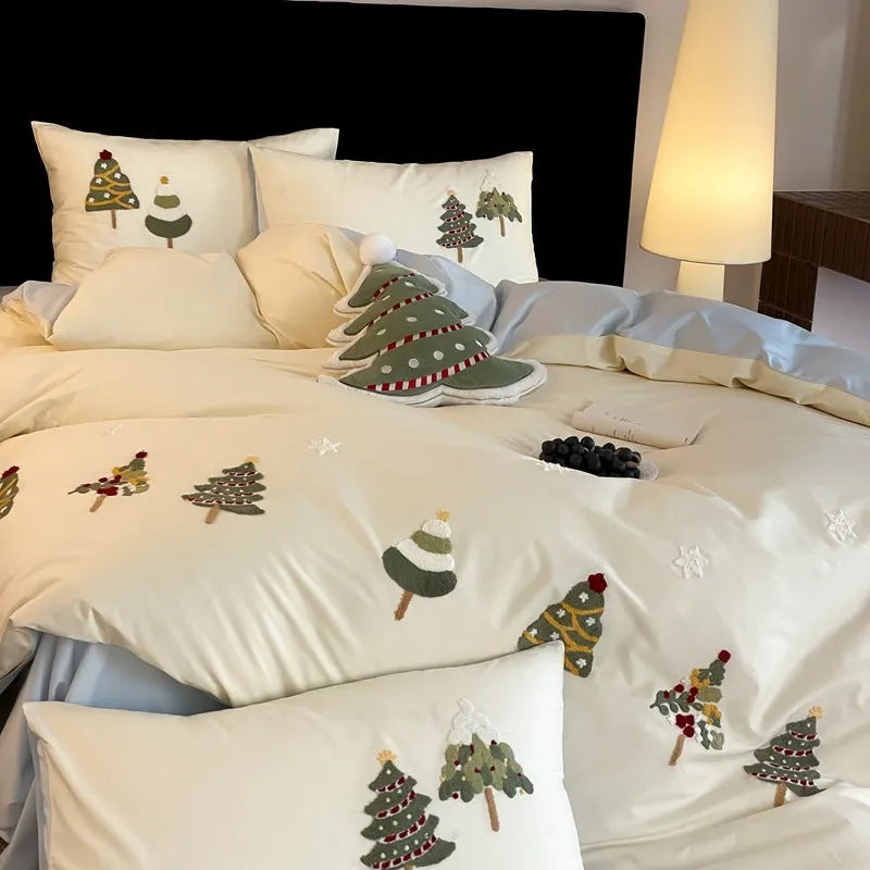 Cream Blue cotton duvet cover with embroidered Christmas tree and floral pattern, part of a four-piece bedding set.