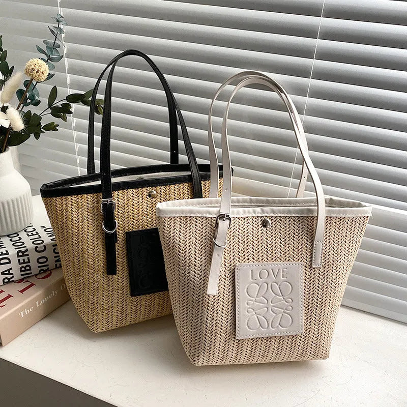 Women's woven straw shoulder bag with European retro style showing large opening and three-dimensional pockets