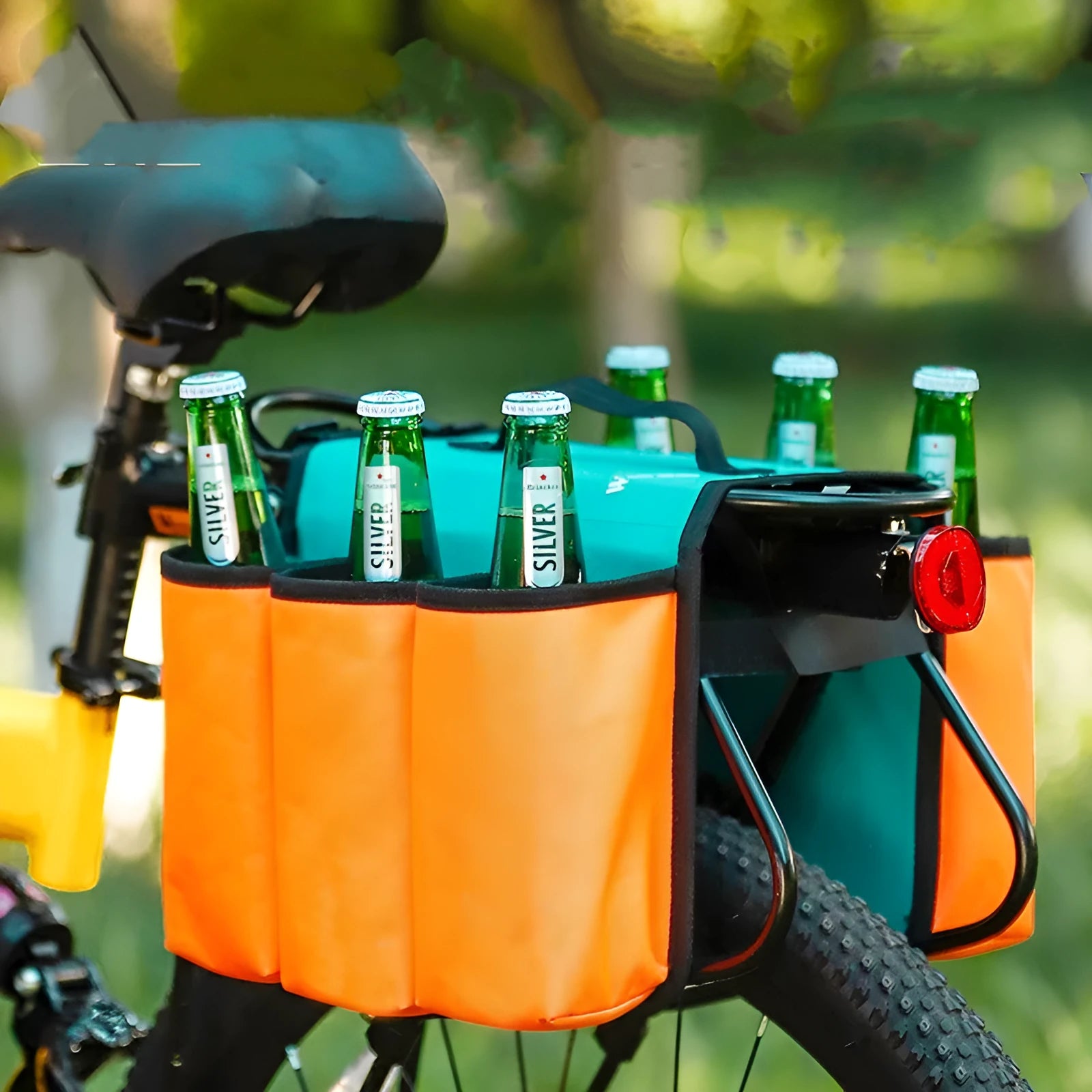 Black and orange bicycle handlebar bag for two drink bottles, made from 600D PVC material.