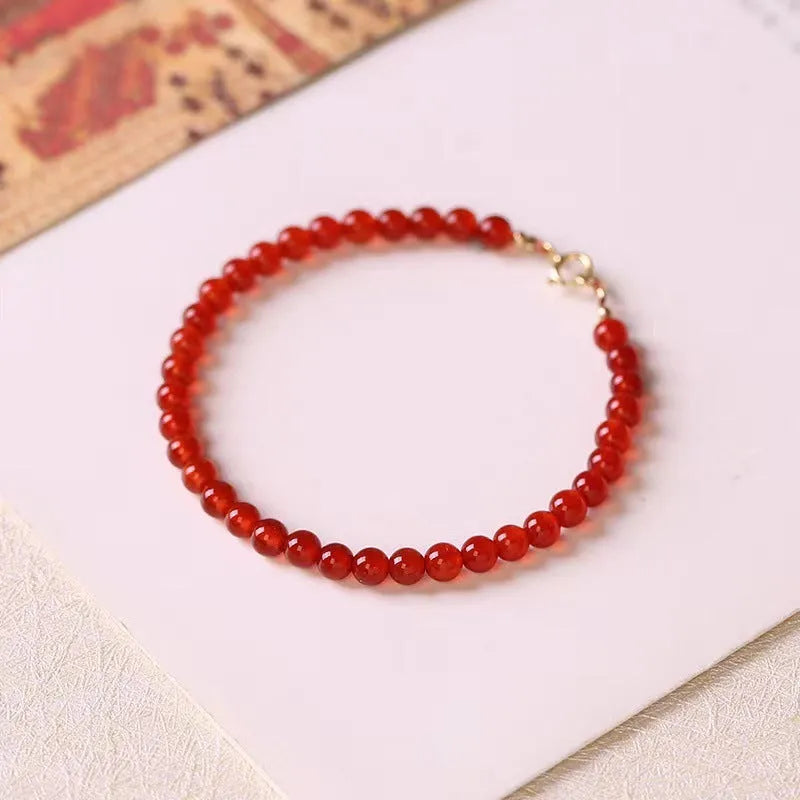 Ultra-thin red agate bracelet for women showing classic style and calm small profile