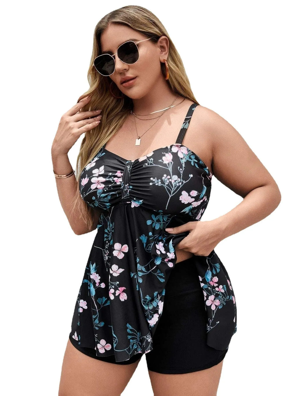Women's floral print one-piece swimsuit on a hanger, showing split colour design and available in sizes 0XL to 4XL.