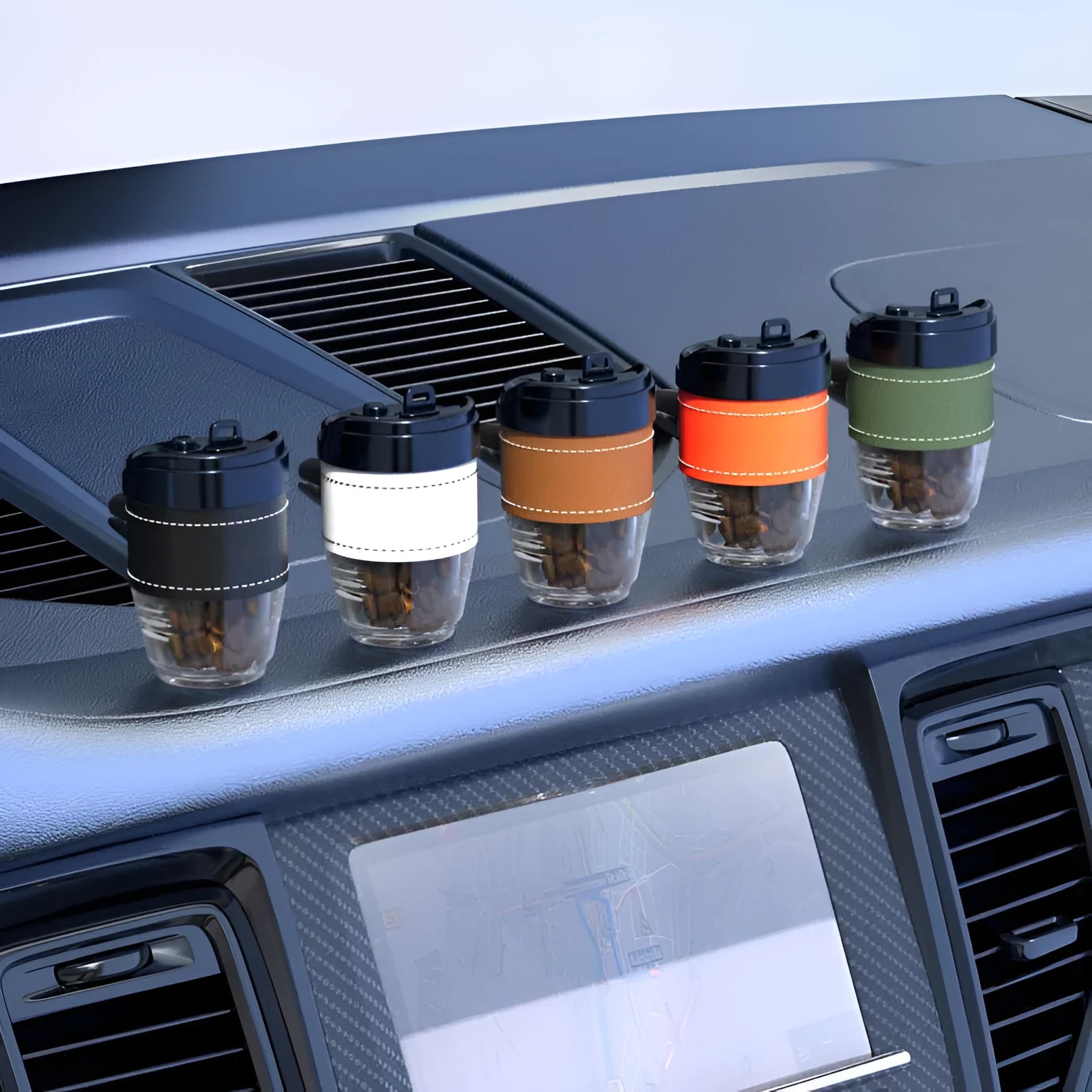 Coffee cup shaped car perfume air freshener in five colour options on car dashboard