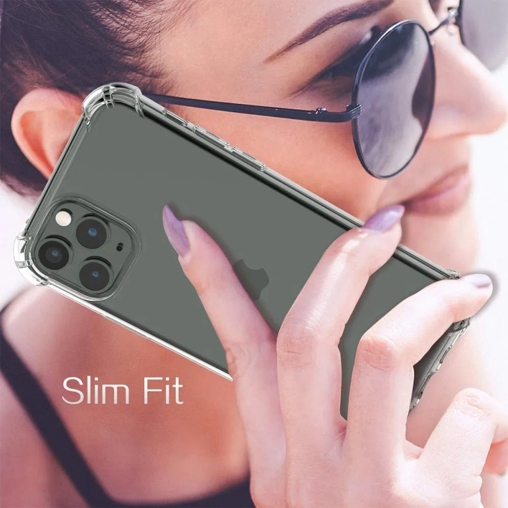 Clear transparent TPU shockproof phone case for various iPhone models on a table.