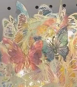 Butterfly night lamp with glass shade on raw wood base for bedside table lighting