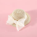 Woven straw hat with pearl bow decoration for cats, available in four colours and two sizes