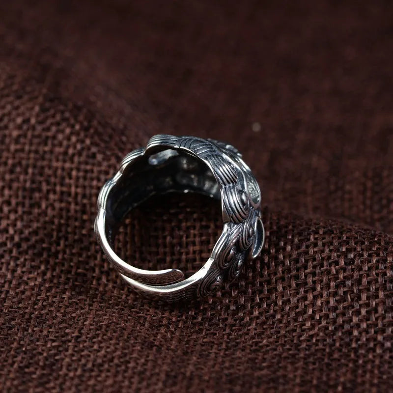Silver open ring with Jibeast pattern detailing and retro styling
