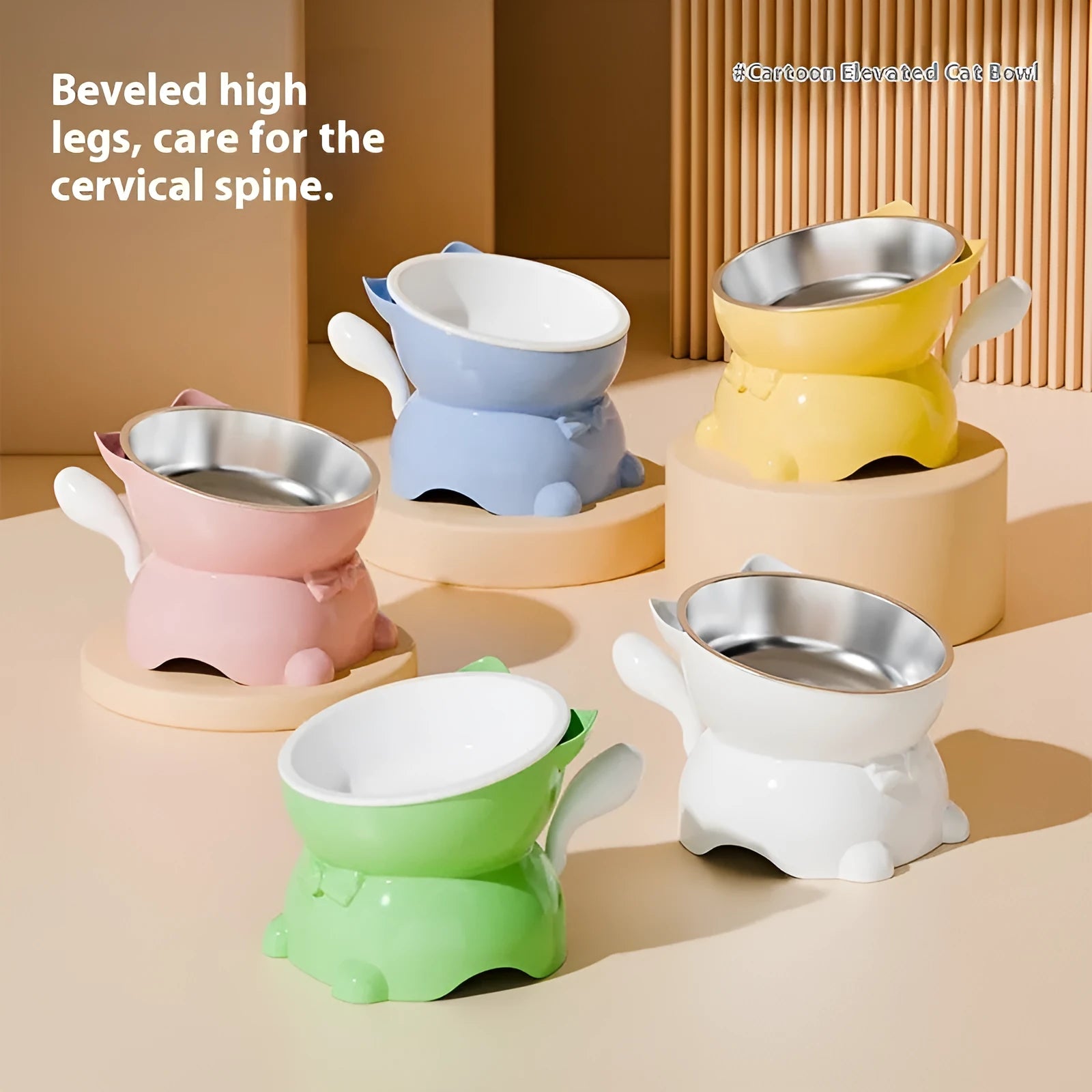 Stainless steel slanted anti-tip cat bowl in colour options of black, blue, pink, and yellow.