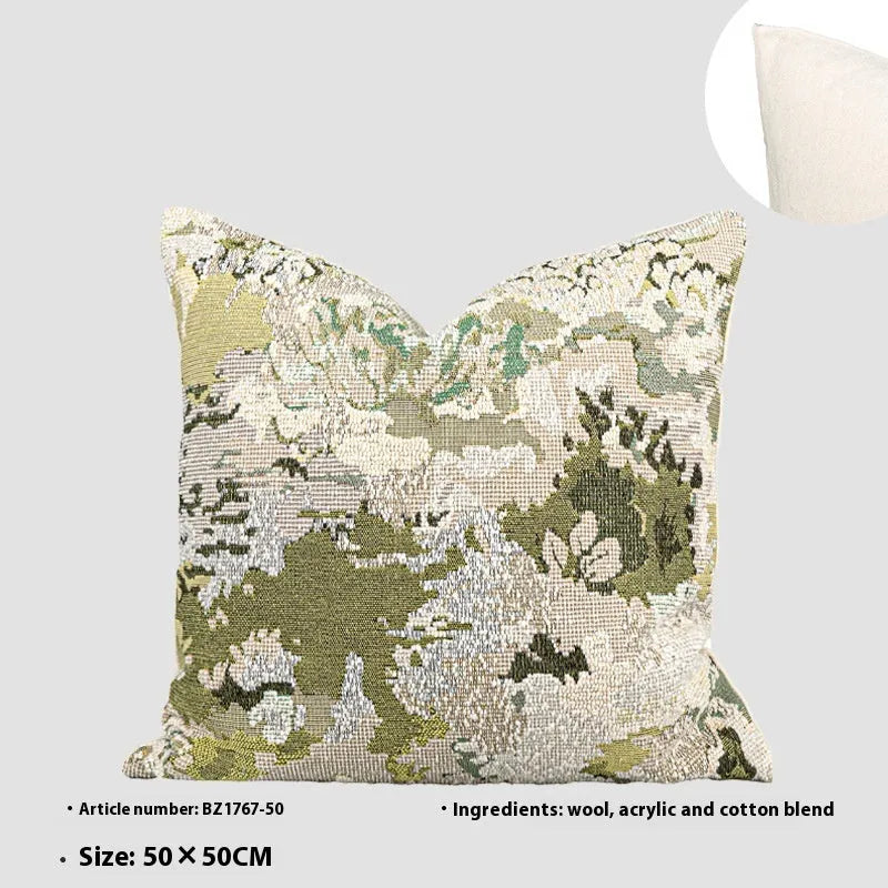 Antique green wool blend cushion with abstract spring flower botanical pattern.