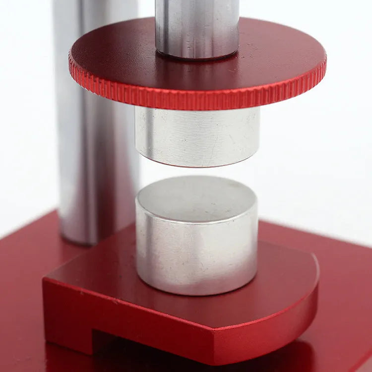 Watch repair spiral cap presser device with a set of 20 plastic moulds for sealing watch back covers.